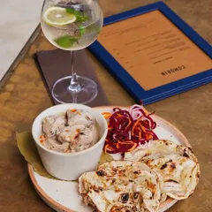 Our smoked chicken curry served with a light and refreshing gin and tonic. The smoky, rich flavours of the curry are balanced by the crispness of the cocktail.