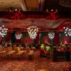 This is a glimpse into a Sufi Durbar I reimagined within a modern lounge. The design blends rich reds, layered arches, and Indo-Islamic prints to create a space steeped in music and poetry, where every detail becomes a verse in the celebration of love.