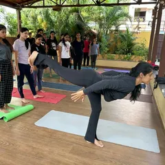 Demonstrating the full expression of Virabhadrasana III (Warrior III) for my students. This pose requires focus, strength, and control, and I guide the class through each step to build their confidence.