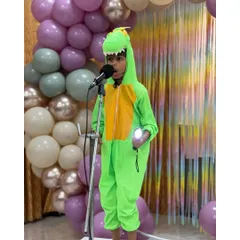 Even in a dinosaur costume, this young performer delivers his monologue with focus and character, showing that confidence comes in all forms.