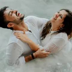 Who says romance can't be playful? This underwater-themed shoot with dry ice was all about creating something unique. The genuine, unrestrained laughter amidst the mist shows that the most creative concepts work best when you can just be yourselves.