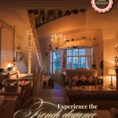 Inside, you'll find a world of French elegance. With sparkling chandeliers, cozy seating, and vintage details at every turn, the ambiance is set for you to relax, connect, and make beautiful memories.