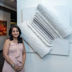 Here I am with "The Flight of Knowledge." This piece embodies the journey of wisdom, with each fold representing a chapter of learning that gives us wings to fly.