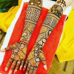 Another angle of a complete bridal design, showcasing how different patterns and motifs like elephants and lotuses come together. Learning to combine elements is a key skill for creating unique bridal art.
