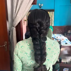 The foundation of a beautiful hairstyle. This is a clean, thick pull-through braid before any accessories are added, showcasing the neatness of the technique.