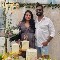 The happy couple at their baby shower celebration. It was a joy to create this beautiful setting for them, complete with a floral and macrame backdrop that made for the perfect photo opportunity.