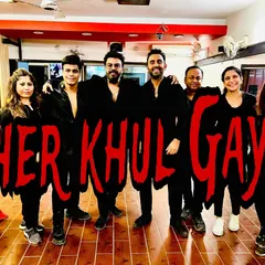 The team behind the magic. This is a group photo of our instructors and senior members after a successful performance of 'Sher Khul Gaye'. It captures the camaraderie and celebratory spirit of our studio.
