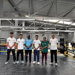 A group photo with some of our dedicated coaches and Capt. I Amaldas in the ring. Our coaching staff is experienced and passionate about the sport.