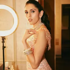 A behind-the-scenes glimpse of the "PHAT" Manish Malhotra sangeet look. The sequined details and modern silhouette are perfect for dancing the night away.