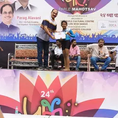 Here is another one of our gold medal winners from the 9 to 14 girls' category receiving her award at the Parle Mahotsav. We focus on strong fundamentals to ensure our students perform their best under pressure.