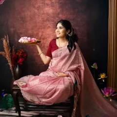 A portrait that feels like a classic painting. Holding a plate of fresh flowers, this expecting mother looks radiant against a backdrop designed to evoke a sense of timeless grace.