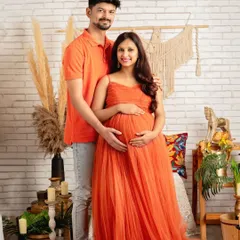 A beautiful portrait of the couple in our boho setup. The coordinated orange tones bring a lovely warmth to the image.