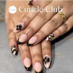 A chic and stylish design featuring a black French tip with a fine gold glitter line. The accent nails include a translucent 3D black flower and gold and black stripes.