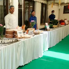 Our professional chefs and staff ready to serve at an outdoor event. From prepping to table decor, their efforts are present every step of the way to ensure a flawless experience.