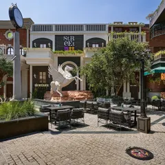 The Pegasus sculpture at Street 1522 is a prime example of integrating large-scale art. I worked to position it as the central axis of the courtyard, turning it into a powerful branding element and a photo opportunity for visitors.