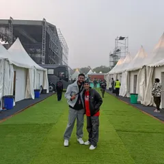 Behind the scenes at the concert. This is the calm before the storm, posing with the crew backstage before hitting the lights. It's all about the journey and the people you share it with.