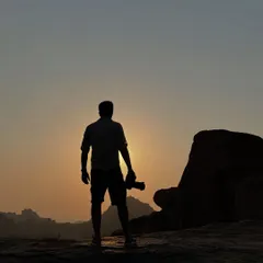 Watching the sunset after a long day of photography. The quiet moments in nature are just as important as the dramatic sightings.