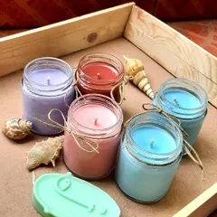 A beautiful array of our custom-colored scented candles. Let us know your theme, and we will create the perfect candles for you.
