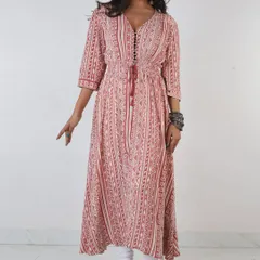 We specialize in lookbook and e-commerce photography for ethnic wear brands. This full-length shot of a model in a printed kurti highlights the garment's flow and design, using precise lighting to ensure true-to-life colors for your online catalog.