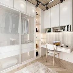 This is how we maximize space with smart design. This bedroom features a floor-to-ceiling wardrobe with translucent sliding doors, integrated with a compact, well-lit study nook, perfect for modern homes.