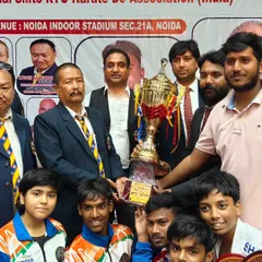 The entire team with our well earned trophy at the DDAA Open National Karate Championship. A proud moment for the Dynamic Sports Karate Academy.