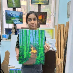 A resting deer in a misty forest. This student did a fantastic job using the blur technique to create a dreamy, gentle atmosphere in her artwork.