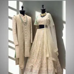 A perfect match. This is the kind of timeless elegance I aim for, pairing a beautifully detailed sherwani with a complementary lehenga. This is the ideal look for a couple on their big day.