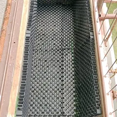 Proper drainage is key to a healthy terrace garden. Before adding soil, I install these drain cell mats, which create a void for excess water to flow away, preventing waterlogging and protecting your roof.