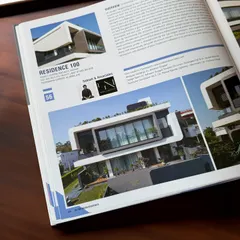 A look inside the "101 Top Indian Residences" book, where Residence 100 is featured for its unique contemporary design.