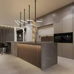 We design sleek, modern modular kitchens that are both beautiful and highly functional. This kitchen features a minimalist aesthetic with handleless cabinets, an elegant island with fluted paneling, and integrated appliances, all built with premium, durable materials.