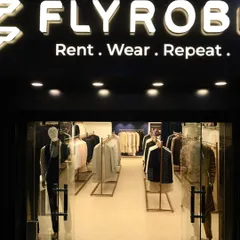 Welcome to our store. This is where you can try on your favorite looks and get personalized styling advice. Our tagline says it all: Rent. Wear. Repeat.