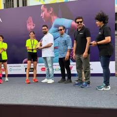 On the podium after winning a 10km race in Noida. Even on days when my mind and body weren't in sync, the training base I've built carried me to the top spot.