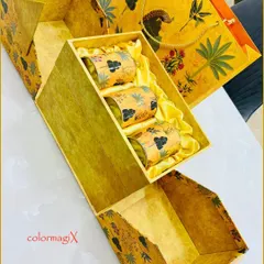 For moments as grand as a wedding, we present our bespoke hampers. This stunning yellow hamper, featuring intricate traditional prints and filled with gourmet selections, is designed to be a memorable part of your celebration.