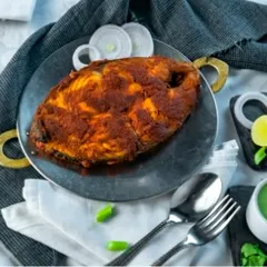 A star of our seafood festival, the Tava Surmai features a fresh steak of kingfish. It's marinated in traditional spices and seared on a hot tava for a crispy skin and succulent interior.