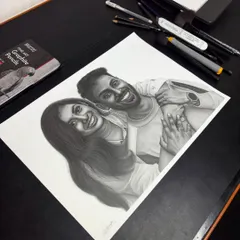 A happy couple from Kerala, captured in a timeless black and white pencil sketch. The A3 size gives enough space to bring out the realistic textures and emotions.
