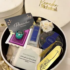 A look inside my premium Ramadan velvet hamper. It's filled with essentials like Zamzam water, premium dates, a Tasbeeh counter, and a Dua card for Suhoor.