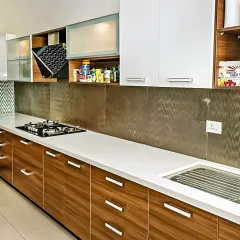 This kitchen showcases a mix of wood-grain and solid white cabinets with sleek metal handles. I included specialized storage like a pull-down dish rack to make daily tasks easier.