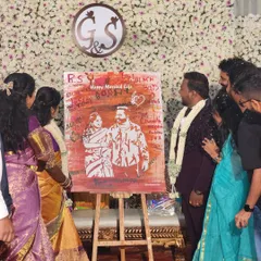 It's wonderful to see the couple and their guests admiring the finished artwork together. This live event painting serves not just as a portrait, but as a summary of the day's joy and celebration.