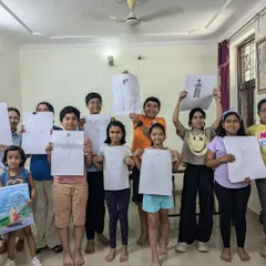 Our students showing their initial gesture drawings from a figure drawing session. We start with these quick sketches to learn how to capture the movement and essence of the human form.