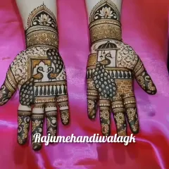 This is the same peacock design as ID 50, shown again for its popularity during Teej. It's a classic design that never goes out of style.