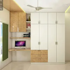 A compact study nook integrated with a floor-to-ceiling wardrobe. The design uses a mix of white and textured laminate for a modern look.