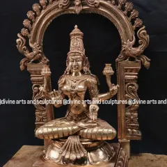 Another view of the Mahalakshmi with Prabhavali, showing the intricate carvings on the arch and the goddess's graceful form.