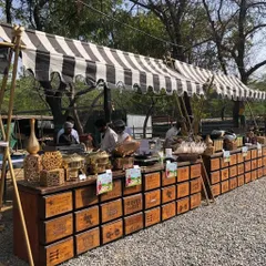 An 'Old MacDonald Had a Farm' themed birthday party. I used these rustic wooden crate-style counters and a striped canopy to create a charming farm-like atmosphere for the buffet.