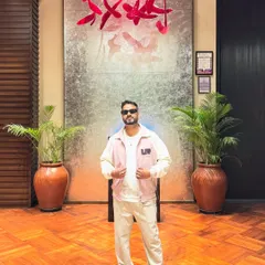 A full-body shot showcasing a trendy outfit.