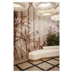 The lenticular wallpaper at Prequel's entrance creates a dynamic, shifting pattern that engages guests. This focus on interactive and tactile details makes the space feel alive and memorable.
