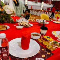 A close-up of our branded table setup, complete with custom placemats and water bottles, adding a professional touch to your event.