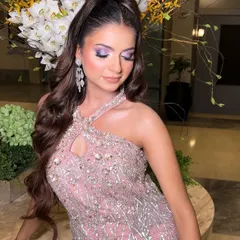 A closer look at this gorgeous engagement glam. The pop of purple on the eyes is perfectly balanced with a flawless base and a neutral lip, making the eyes the star of the show.