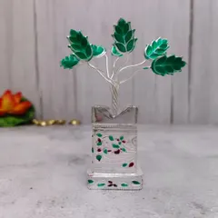 A German silver Tulasi plant. The Tulasi is a sacred plant in Hinduism, and this makes for a very thoughtful and blessed gift.