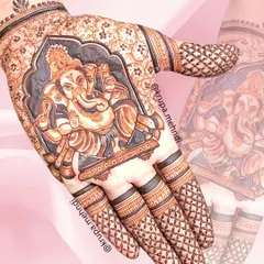 This detailed portrait of Lord Ganesha is one of my favorite designs to create for the auspicious occasion of Ganesh Chaturthi. I focus on capturing the divine expression and intricate details, making it a special blessing on your hands.