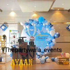 A large-scale Hot Air Balloon theme on a stage, with multiple balloon sculptures and a custom backdrop.
